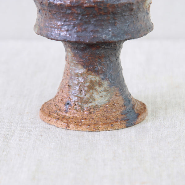 Annikki Hovisaari chamotte studio ceramic, showing the coarse geological texture of the clay beneath areas of expressive glaze.