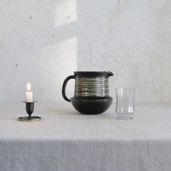 Swedish studio pottery jug by Karin Björquist, created at Gustavsberg during the 1960s, exemplifying Nordic Modern ceramics, together with Tamara Aladin Star glass and Richard Rohac small brass candlestick. 