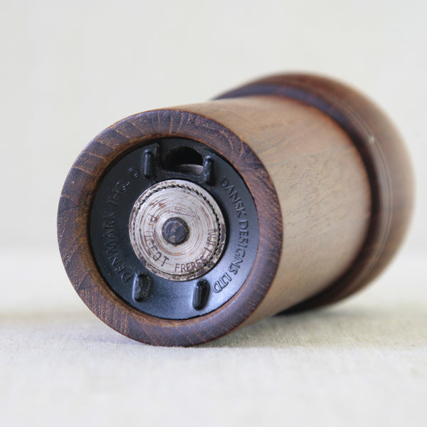 Peugeot Grinder on Gunnar Cyrén Danish Modern teak tableware for Dansk, pairing a sculptural pepper mill with its matching salt shaker.