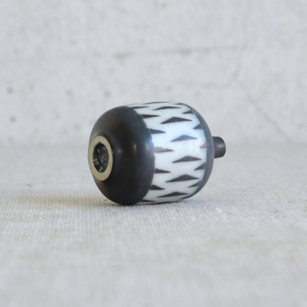 Rörstrand miniature vase designed by Gunnar Nylund with applied geometric pattern