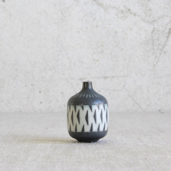 Gunnar Nylund designed Rörstrand miniature vase with modernist black and white motif
