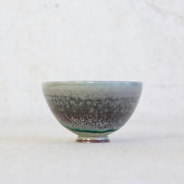 Exquisite Berndt Friberg bowl with turquoise centre and refined porcelain form; iconic Gustavsberg Scandinavian design for connoisseurs.