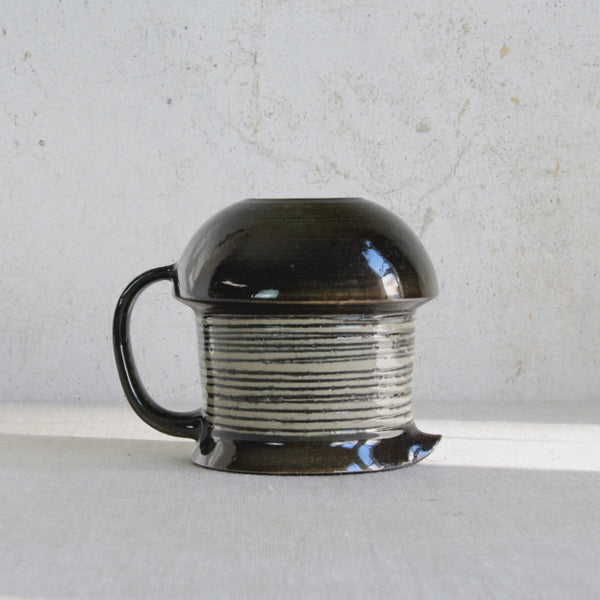 Collectible studio pottery jug by Karin Björquist, produced at Gustavsberg, Sweden, reflecting the shift toward organic Modernism in the 1960s.