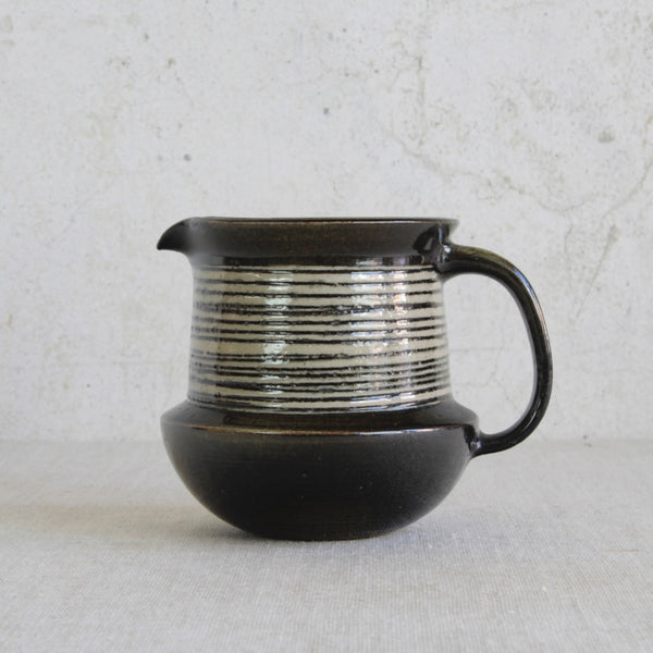 Unique studio pottery jug by Karin Björquist, handmade at the Gustavsberg art studio in Sweden, circa 1960, representing Scandinavian Modern design.