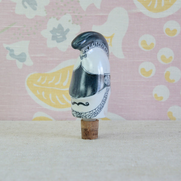 Close view of Guy Neale's humorous Cavalry Officer bottle topper, decorated by Susan Parkinson in the pottery's distinctive expressive style.