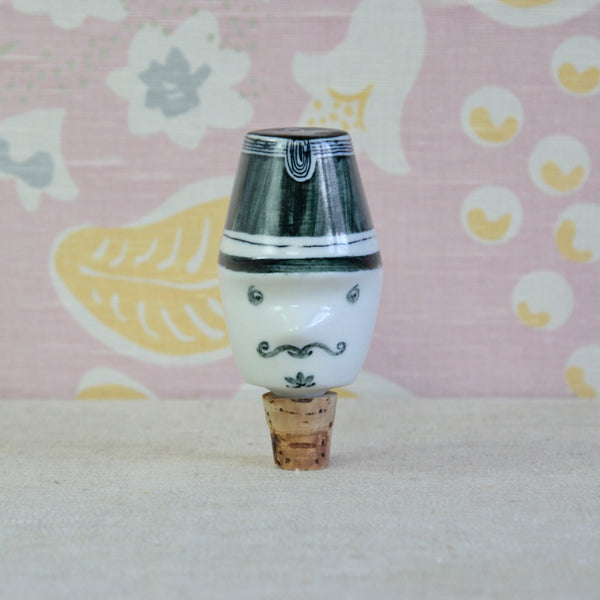 Guy Neale French Gendarme porcelain bottle stopper for Parkinson Pottery, distinguished by his traditional képi and painted moustache.