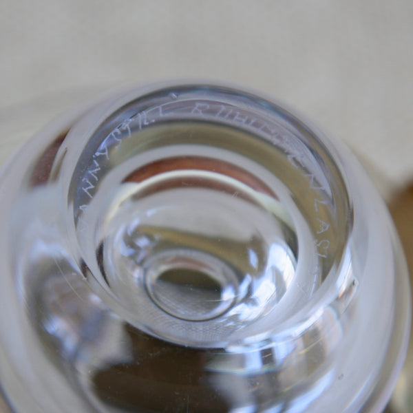 Detail of hand etched signature on the base of a Saturnus glass vase / art object designed by Finnish Modernist designer Nanny Still, Riihimäki, 1960s mid-century modern collectible.