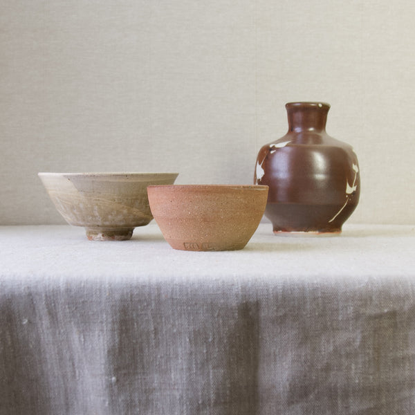 Group of Jim Malone Ainstable and Lesson Hall local Cumbrian studio pottery vases and bowls.