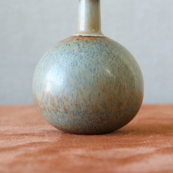 detail of mottled haresfur green grey glaze from Rorstrand sweden on a carl-harry stalhane ball-shaped vase
