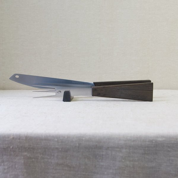 Mood shot showing a carving knife set by Tapio Wirkkala for Hackman. The wood if black oak from the Vasa which, after almost 333 years in darkness, finally rose from the deep in April 1961.