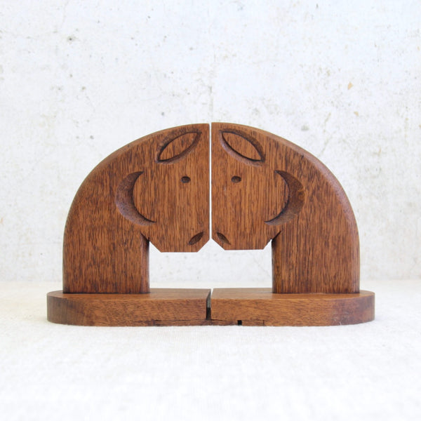 Vintage English oak horse bookends from the 1950s, expertly hand-carved with elegant stylised equine forms.