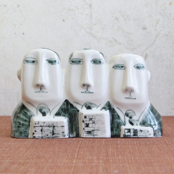 Head on shot of Susan Parkinson commuter sculpture The 8.15, combining social realism with Modernist restraint in the tradition of post-war English ceramics.