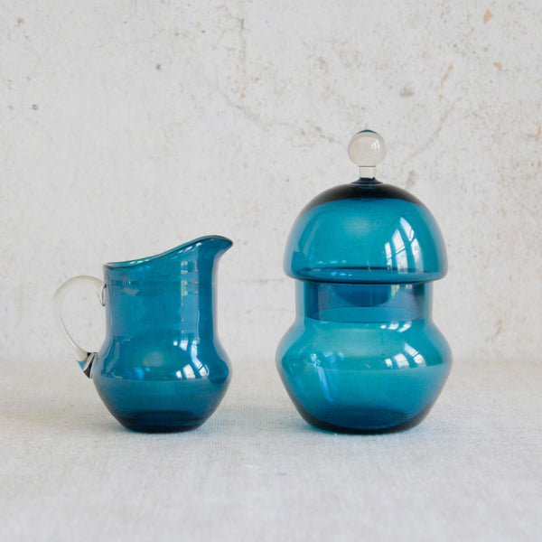 Collectible Finnish glass sugar bowl and creamer designed by Helena Tynell for Riihimäki, known for its short Pomona production run