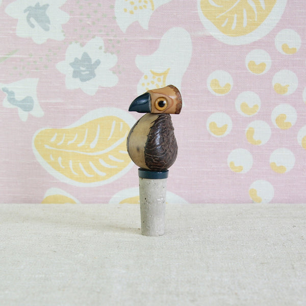 1920s Art Deco YZ bird bottle stopper with tagua nut body and navy blue Bakelite beak