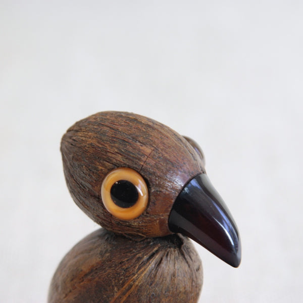 YZ Art Deco bird tray with dramatic carved mahogany dish, semi-translucent Bakelite beak and layered glass eyes.