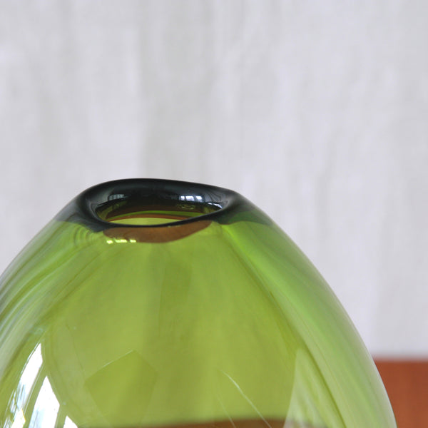 Detail of Per Lütken Dråbevase in brilliant Majgrøn glass, designed for Holmegaard in 1955 with a softly rounded organic form.
