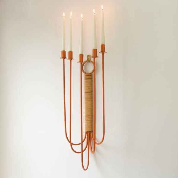 Massive midcentury modern wall hanging candle sconce. With its unique color and striking design, Umanoff's candelabrum is a bold statement piece for any space.
