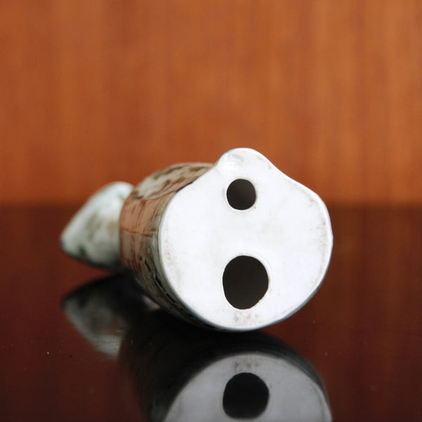 Detail of underside or base of a hand-decorated British studio pottery cat, 1950s, Susan Parkinson. Richard Parkinson Pottery makers marks / stamps remain somewhat elusive.