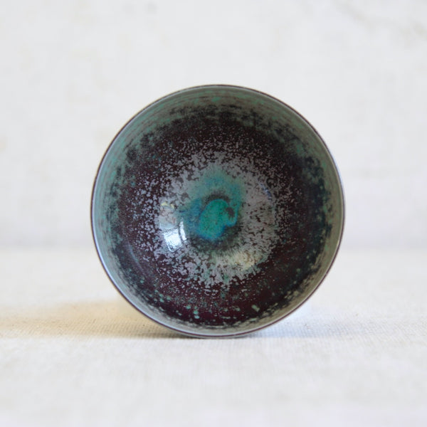 Head on shot showing the interior of an elegant thin-walled porcelain Gustavsberg bowl by Friberg with nebula-like glaze; exceptional Nordic craftsmanship for collectors of fine ceramics.