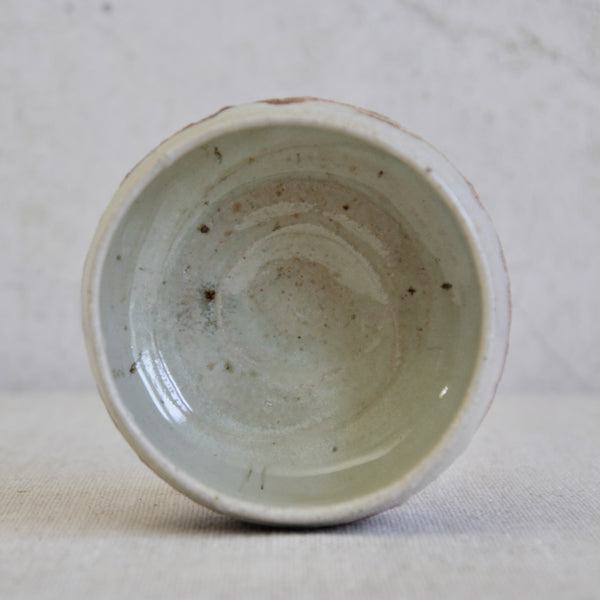 Phil Rogers Anglo-Oriental chawan displaying traditional tea bowl form and rich glaze contrasts.