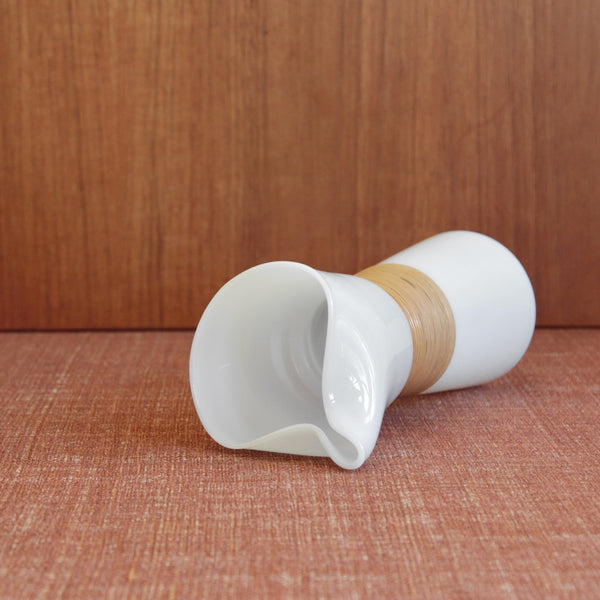 A sculptural Kastrup Glassworks Opaline carafe, showcasing the clean Scandinavian aesthetic and functionalist style associated with mid-century Denmark. Jacob Bang design.