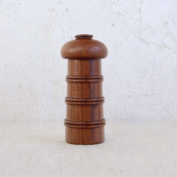Lead image of a Danish modern lighthouse shaped pepper mill by Jens Quistgaard for Dansk Designs Ltd.