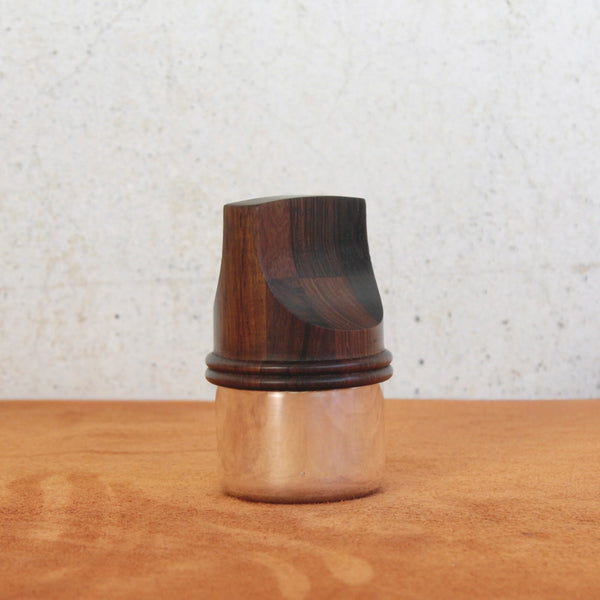 A rare collectible pepper mill designed by Jens Quistgaard for Dansk Designs from the Rosewood & Silver series.
