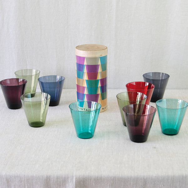 Kaj Franck model 2744 Kartio glasses for Nuutajärvi, designed in 1953, with simple conical forms in an assortment of vivid colours.
