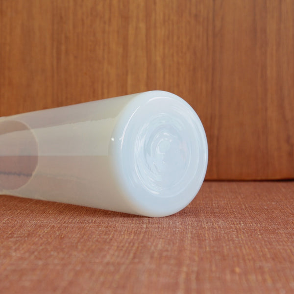 The Kastrup Glassworks Opaline carafe showing its smooth shiny finish and functional Danish industrial design roots. Jacob Bang design for sale in the UK and available for worldwide shipping.