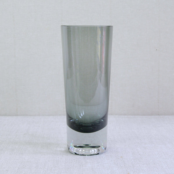 A substantial cool smoke grey and clear cased-glass model KF267 vase, designed by Kaj Franck for Nuutajärvi Notsjö, Finland. The sleek Finnish design is 26.5 cm tall and can hold a good sized bouquet of flowers.