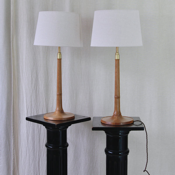 Esben Klint Model 301/27 Danish table lamps in oak and brass, a matching restored pair available from UK design gallery Art & Utility.