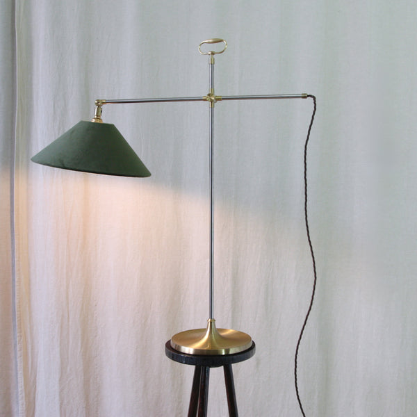 Mid-century modern desk lamp with a dark green velvet conical shade and brass metal frame, Esben Klint Model 319 table lamp for Le Klint, a collectable 1960s Danish adjustable light photographed for Art & Utility.