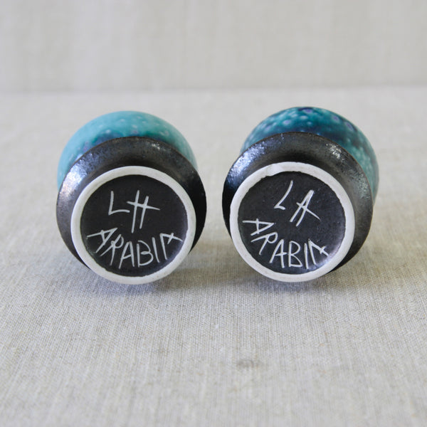 Underside of Liisa Hallamaa Arabia small candle holders.