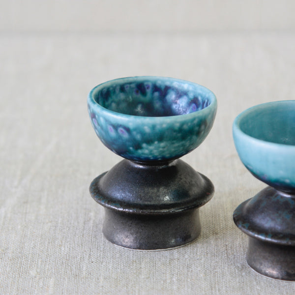 Turquoise and cobalt glazed ceramics by Liisa Hallamaa for Arabia, showing the pooling and bubbling of the expressive hand-applied glaze.