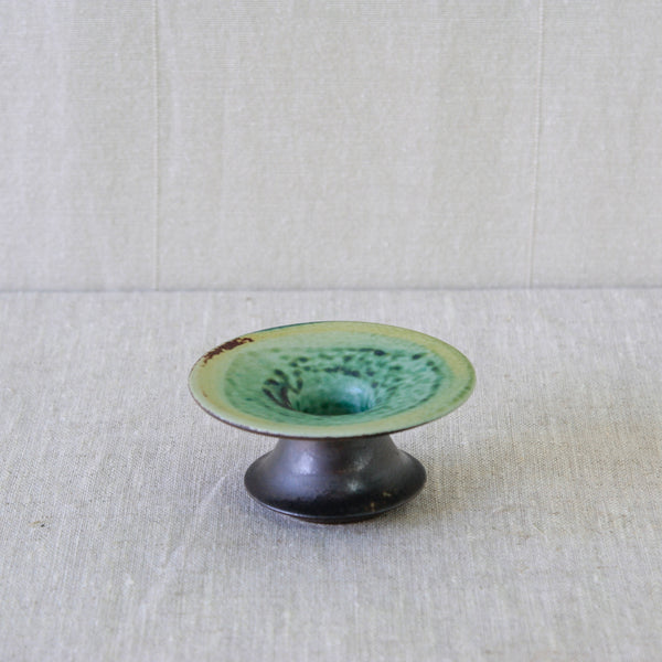 Finnish studio pottery candleholder by Liisa Hallamaa, handmade in stoneware at Arabia during the early 1960s.