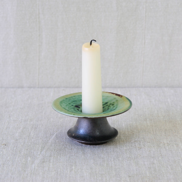 Liisa Hallamaa Scandinavian Modern candleholder for Arabia Finland, combining functional design with an unusually sculptural silhouette.