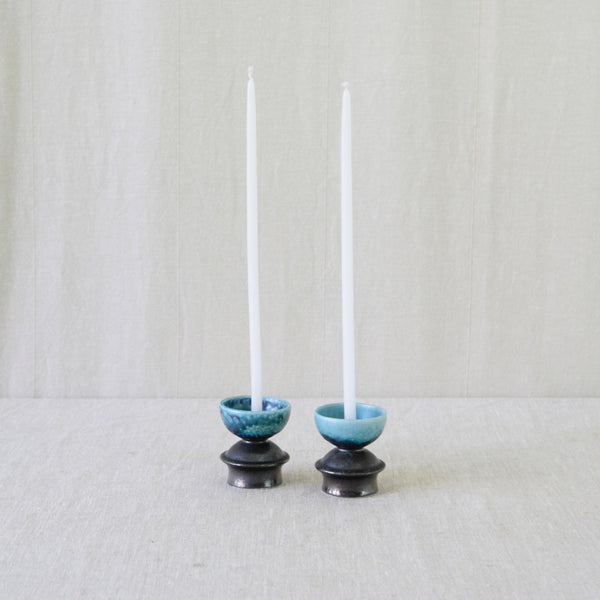 Liisa Hallamaa Finnish studio pottery candleholders, combining simple functional forms with experimental hand-applied glazes.
