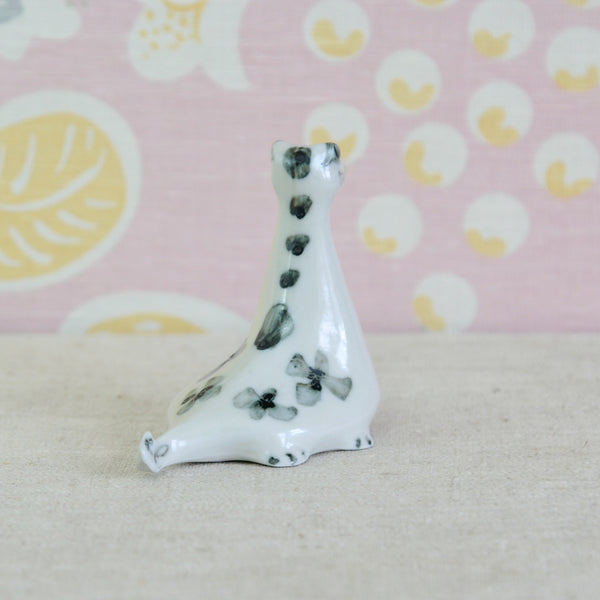 Bayswater Group-era British ceramic figurine, Susan Parkinson Nessie an expressive post-war monochrome pottery ornament.