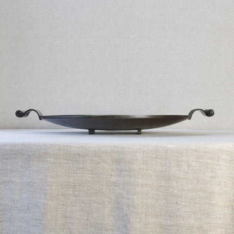 Straight on shot of an opulent Swedish Grace bronze platter designed by Einar & Sune Bäckström 