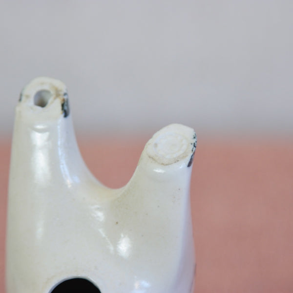 Close-up of Susan Parkinson makers mark used at her Kent pottery.