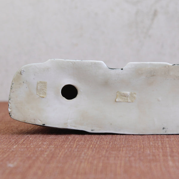 Detail of base of a Post-war British porcelain sculpture by Susan Parkinson, reflecting the expressive figurative language seen in Picassoettes work by Newland and Hine.