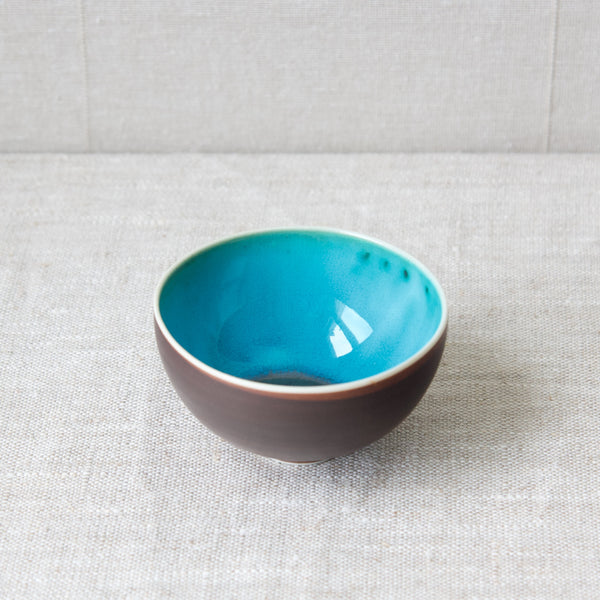 Vibrant blue glaze inside an Arabia Finland porcelain tea bowl, designed in the 1950's by Friedl Holzer-Kjellberg