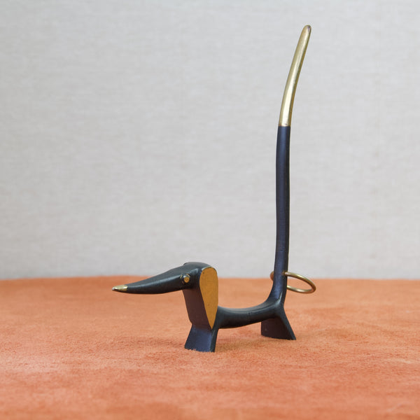 Modern Vienna brinze dachshund dog pretzel holder, designed by Walter Bosse for Herta Baller