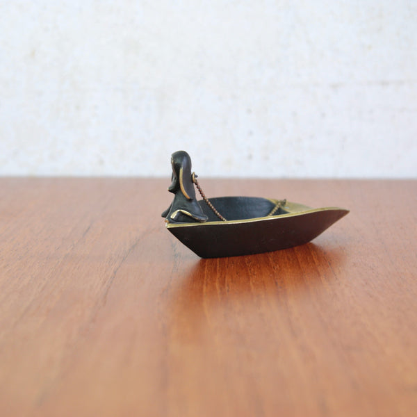 Rare Walter Bosse ashtray in the form of a boat with dog tamper, handmade in Vienna by Herta Baller, 1950s.