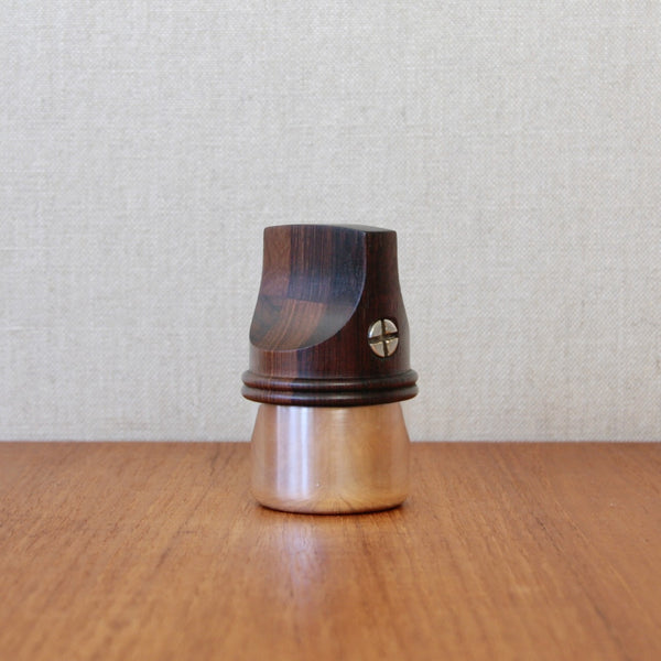 Profile image of a rare pepper mill from Jens Quistgaard’s Rosewood & Silver series for Dansk Designs, carved from staved rosewood with silver-plated detailing.