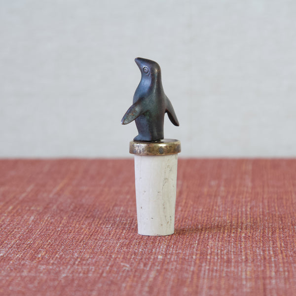 Add a touch of whimsy to your home bar with this iconic Walter Bosse penguin bottle stopper.