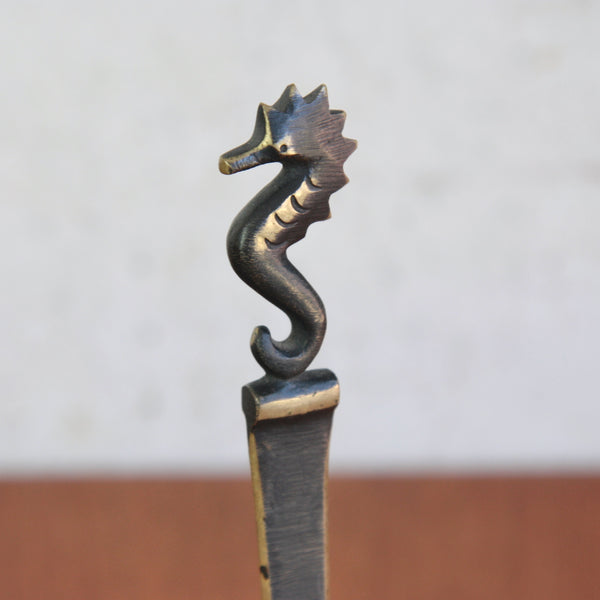 Mid-century sculptural marine-life seahorse letter opener by Walter Bosse, hand-finished by maker Herta Baller.