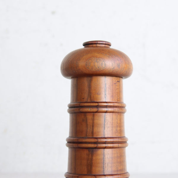 Top section of a vintage Scandinavian pepper mill by Jens Quistgaard made for Dansk Designs. Artistic photograph.