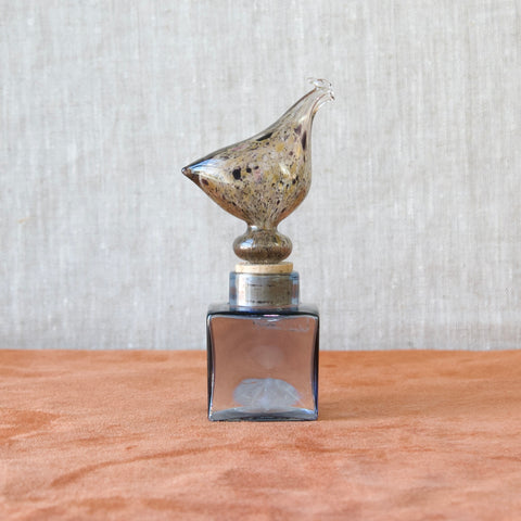 A Model KF254 Hen Bottle, the small square shaped squat decanter stands as a testament to the genius of Kaj Franck and the timeless appeal of his design philosophy.