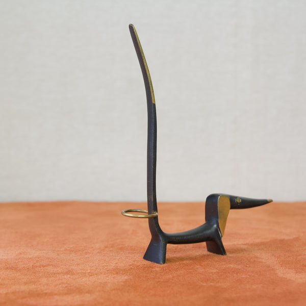 Pretzel or ring holder designed by Walter Bosse for Herta Baller, Austria, in the form of a Modernist elongated dachshund dog